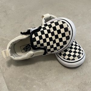 Vans black and white slip on. Toddler size 7.